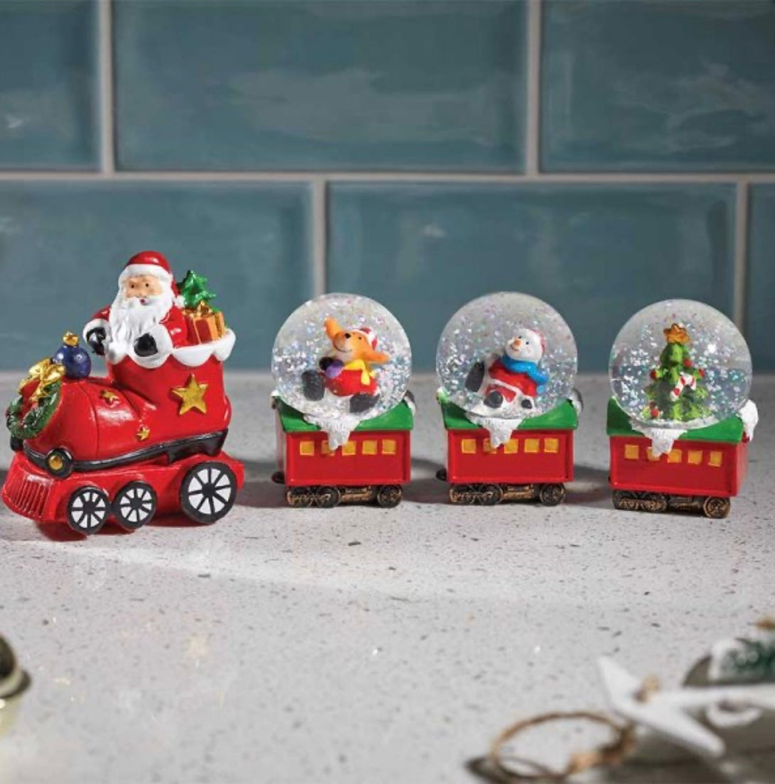 Mini Christmas train decoration with 4 glitter snow globes featuring Santa, reindeer, snowman, and Christmas tree on red train carriages