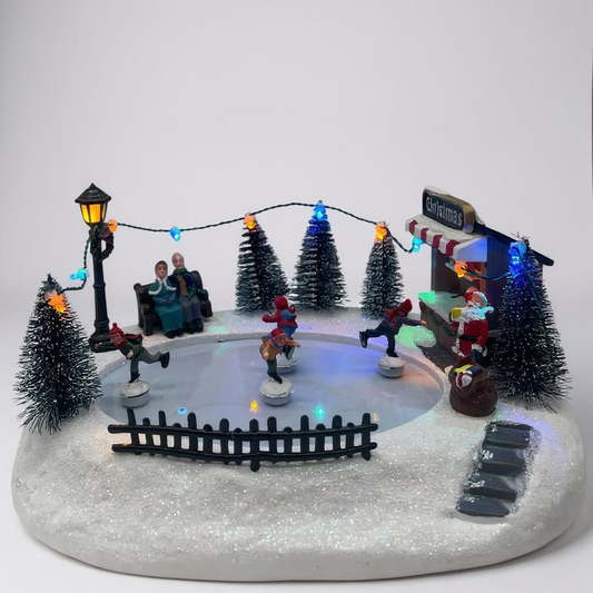 Lighted Christmas Ice Skating Scene with Moving Figures & LED Lights – Holiday Village Display