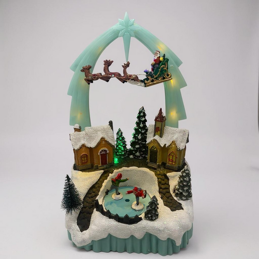Santa Archway Christmas Village Scene with LED Lights & Skaters – Animated Holiday Display